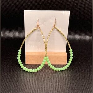Stunning light green jeweled dangle hoops